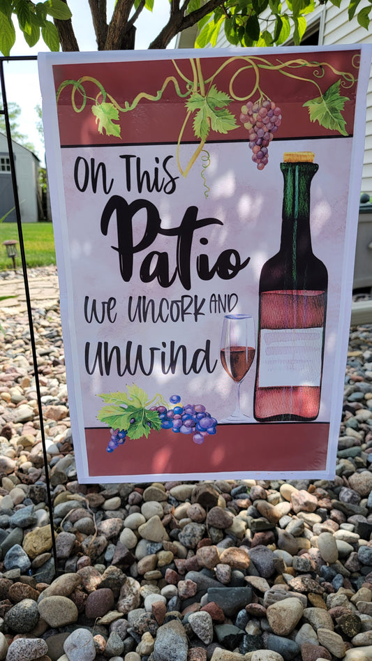 On This Patio We Uncork and Unwind Garden Flag